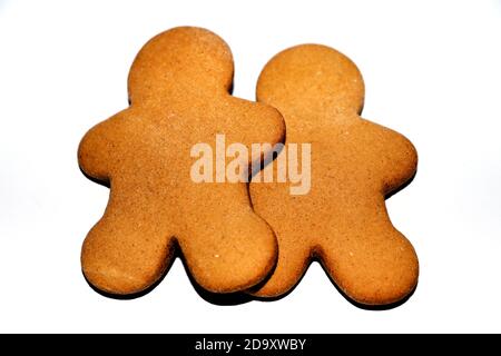 Two gingerbread men on a white background Stock Photo