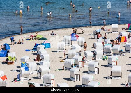 Sellin: Strandkorb (beach chair), bather, Baltic Sea, Ostsee (Baltic Sea), Rügen Island, Mecklenburg-Vorpommern, Germany Stock Photo