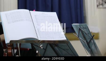 Music sheets on a stand Stock Photo