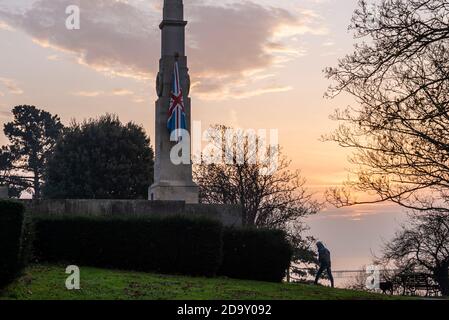 Southend on Sea, Essex, UK. 8th Nov, 2020. Remembrance Sunday has dawned bright but hazy, with many people taking the chance to exercise along the seafront during the second COVID 19 lockdown period. Dog walkers are also out walking the top of the cliffs by the town’s war memorial and cenotaph Stock Photo