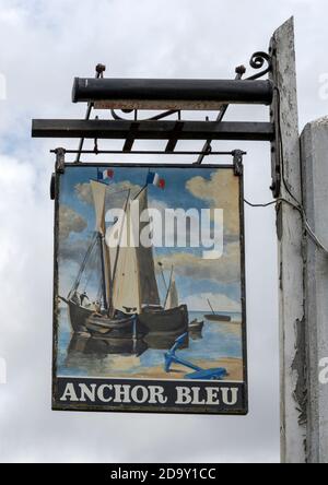 Traditional hanging pub sign at the Anchor Bleu  public house, High Street, Bosham, nr Chichester, West Sussex, England, UK Stock Photo