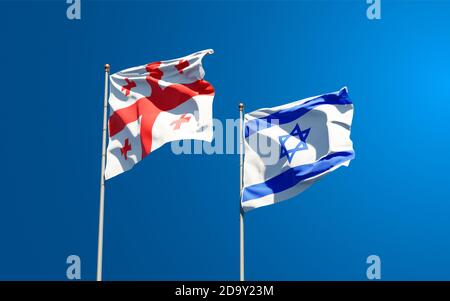 Beautiful national state flags of Georgia and Israel together at the sky background. 3D artwork concept. Stock Photo