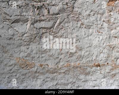 Old plastered stone wall background, plaster wall texture Stock Photo