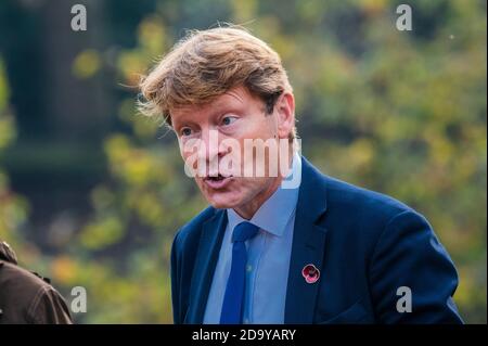 London, UK. 08th Nov, 2020. Richard Tice who was chairman of the Brexit Party and elected as a Brexit Party Member of the European Parliament for the East of England at the 2019 joins the group - electionLaurence Fox, Reclaim Party leader, pays his respects on Remembrance Sunday at the Royal Artillery war memorial at Hyde Park Corner - he was joined by a small group of veterans and supporters as they made their way from Green Park. It is remembrance Sunday and due to the second Coronavirus Lockdown, services of commemoration are greatly curtailed. Credit: Guy Bell/Alamy Live News Stock Photo