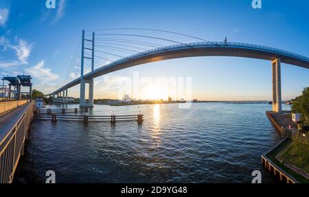 Stralsund: New Rügen Bridge of Strelasund Crossing, Old Town Stralsund, left Ziegelgraben Bridge, a bascule bridge over the Ziegelgraben stream, sunse Stock Photo
