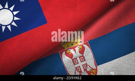 Taiwan and Serbia two flags textile cloth, fabric texture Stock Photo