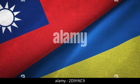 Taiwan and Ukraine two flags textile cloth, fabric texture Stock Photo