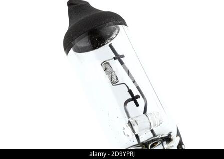 Macro shot of a blown H7 type automotive bulb, isolated on a white background with clipping path. Stock Photo
