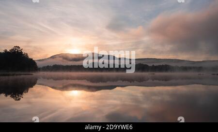 Powder Mill pond is close to Crotched Mountain and a beautiful place to watch the sunrise. Stock Photo