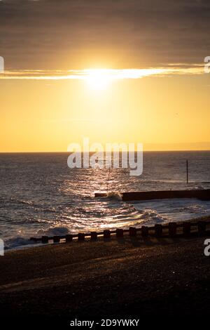 The Sun Setting Over Galley Hill in Bexhill, seen from St Leonards Stock Photo