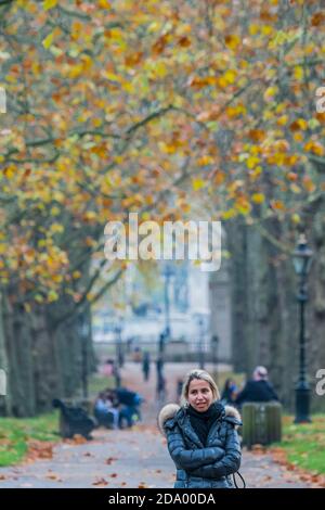 London, UK. 08th Nov, 2020. There are plenty of people out and about, despite the new restrictions. Enjoying the autumn weather and colours in Green Park on the first weekend of the second Coronavirus Lockdown. Credit: Guy Bell/Alamy Live News Stock Photo