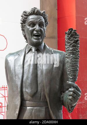 Statue of Ken Dodd at Lime Street railway station, Liverpool, Merseyside, England, UK - called 'Chance Meeting' sculptured by Tom Murphy.