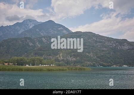 Udine, Italy, August 2019. General view of Lake Cavazzo with the mountains in the background. Stock Photo