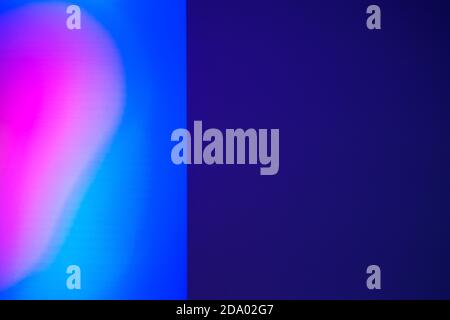 Abstract background with half pink heart shape on blue color and violet empty side. Blurred backdrop, copy space Stock Photo