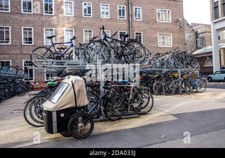 two-tier cycle parking rack with bikes in Cambridge University Stock Photo
