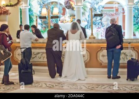 Bride and Groom checking into a Las Vegas hotel Stock Photo