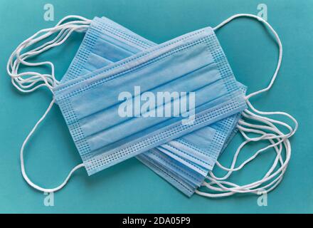 Medical hygiene masks, protection against coronavirus, germs, viruses, bacteria, top view Stock Photo