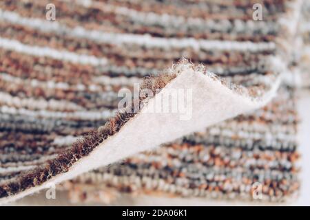 Samples of carpet bundle. Examples of multi-colored carpet in a swatch. Stock Photo