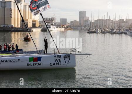 LES SABLES D'OLONNE, FRANCE - NOVEMBER 08, 2020: Jean Le Cam boat (Yes We Cam) in the channel for the start of the Vendee Globe 2020 Stock Photo