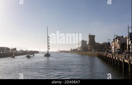 LES SABLES D'OLONNE, FRANCE - NOVEMBER 08, 2020: Jean Le Cam boat (Yes We Cam) in the channel for the start of the Vendee Globe 2020 Stock Photo