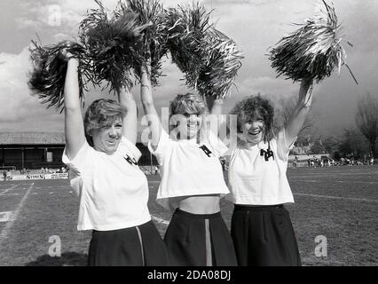 1983 The Dallas Cowboy Cheerleaders perform their USO show America and Her  Music on the deck of the nuclear-powered guided missile cruiser USS  BAINBRIDGE (CGN-25 Stock Photo - Alamy