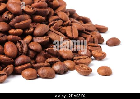 Handful of coffee beans close up isolated on white background Stock Photo