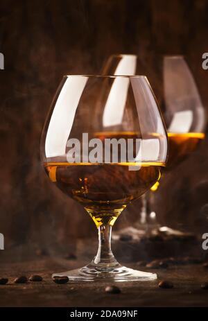Armagnac, French grape brandy, strong alcoholic drink. Still life in vintage style, selective focus Stock Photo