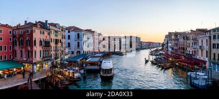 A Panoramic Image Of The Grand Canal Taken From The Rialto Bridge, Venice, The Veneto Region, Italy. Stock Photo