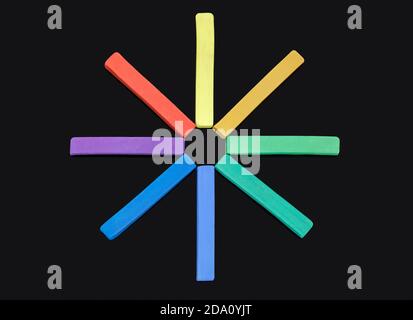 Multi-coloured artists soft pastels arranged in a circle Stock Photo