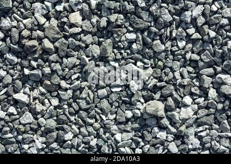 The background is made of fine rubble. Construction materal. Stock Photo