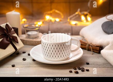 Empty white Cup on a saucer on a festive background. Stock Photo