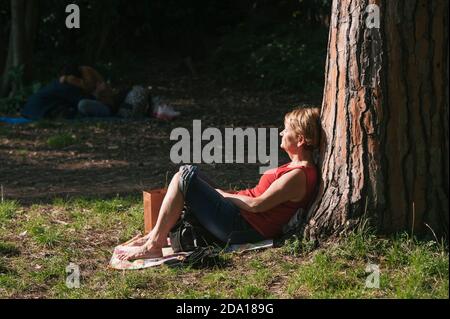 Napoli, Italy. 08th Nov, 2020. A woman seen sunbathing in Villa Floridiana. Credit: SOPA Images Limited/Alamy Live News Stock Photo