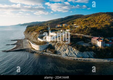 Beautiful aerial panorama of Arkhipo-Osipovka beach and promenade in Gelendzhik region, black sea coast, resort for vacations and pleasure, view from above. Stock Photo