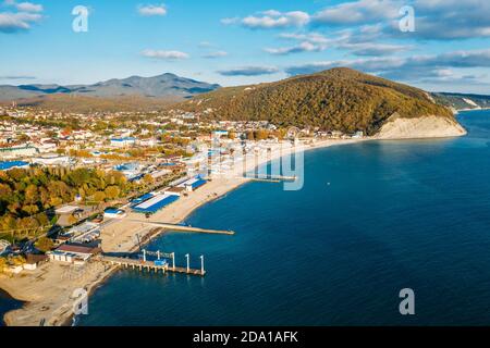 Beautiful aerial panorama of Arkhipo-Osipovka beach and promenade in Gelendzhik region, black sea coast, resort for vacations and pleasure, view from above. Stock Photo