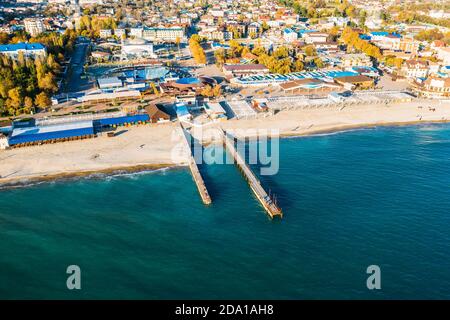 Beautiful aerial panorama of Arkhipo-Osipovka beach and promenade in Gelendzhik region, black sea coast, resort for vacations and pleasure, view from above. Stock Photo