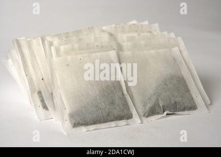 Pile pair of English tea bags isolated on white. Stock Photo