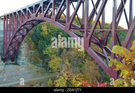 LETCHWORTH STATE PARK, NY –17 OCT 2020- View of the landmark Genesee Arch Bridge in Letchworth State Park in Castile, New York, during foliage season Stock Photo