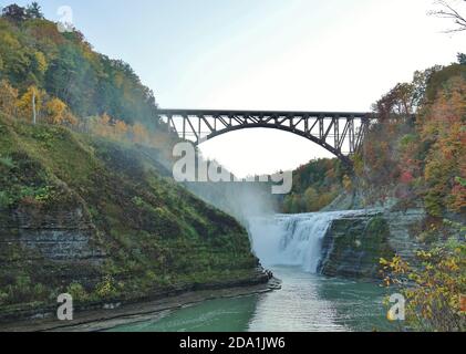 LETCHWORTH STATE PARK, NY –17 OCT 2020- View of the landmark Genesee Arch Bridge in Letchworth State Park in Castile, New York, during foliage season Stock Photo