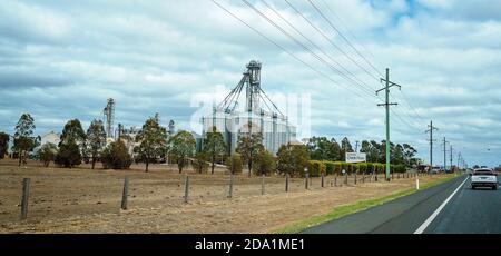 Toowoomba, Queensland, Australia - October 2019: Grain silos for storing chick peas and other seeds on the side of the highway Stock Photo