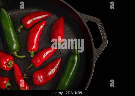 Peppers on an Iron Skillet Pan Stock Photo