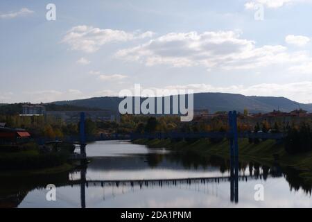 Waterway and Bridge in a Cloudy Day Stock Photo