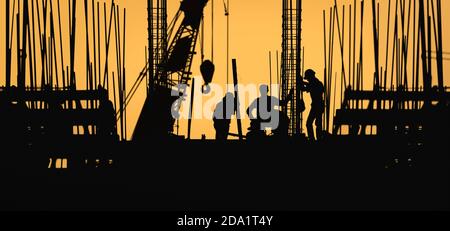 construction worker silhouette on the work place Stock Photo