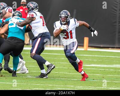 Houston Texans running back David Johnson (31) rushes against the Cleveland  Browns during an NFL football game in Cleveland, Sunday, Sept. 19, 2021,  (AP Photo/Rick Osentoski Stock Photo - Alamy