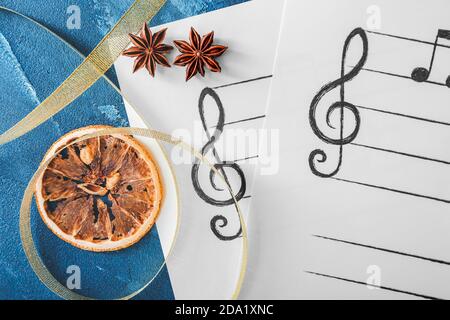 Composition with note sheets and Christmas decor on table Stock Photo