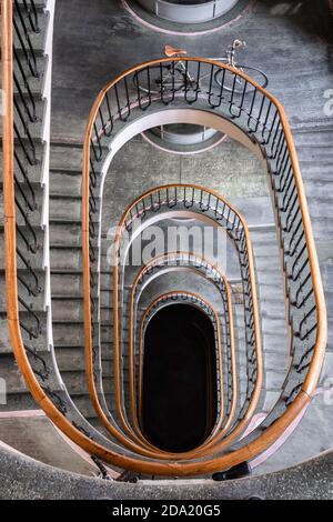 Looking down at the spiral staircase Stock Photo