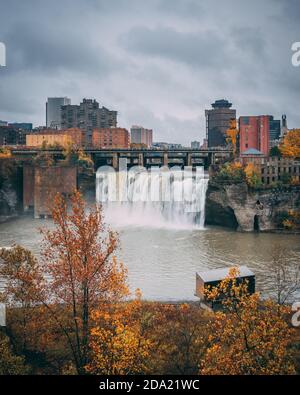 High Falls on the Genesee River with autumn color, in Rochester, New York Stock Photo