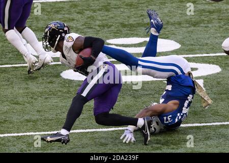 Indianapolis, Indiana, USA. 8th Nov, 2020. Baltimore Ravens wide receiver James Proche (11) runs by Indianapolis Colts strong safety Khari Willis (37) after catching a pass during the game between the Baltimore Ravens and the Indianapolis Colts at Lucas Oil Stadium, Indianapolis, Indiana. Credit: Scott Stuart/ZUMA Wire/Alamy Live News Stock Photo