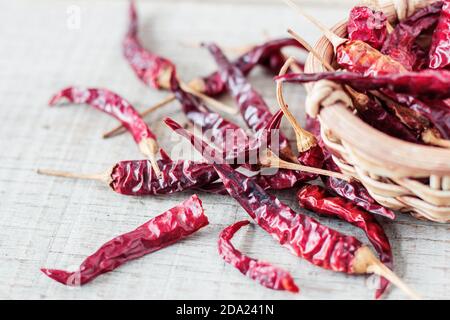 Dried chilli on the old wooden floor. Stock Photo