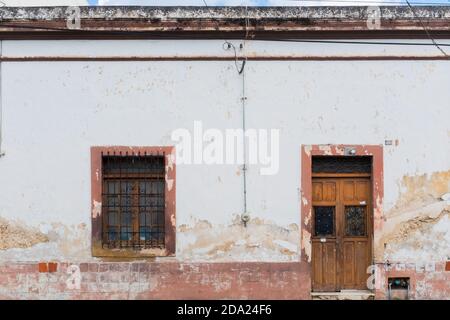 Old decayed facade of a house, Historic center, Merida Mexico Stock Photo