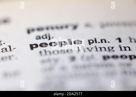 Macro close up of old English dictionary page with word people Stock Photo